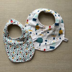 Coppia di Bavaglini Animaletti in bottiglia e Triangolini